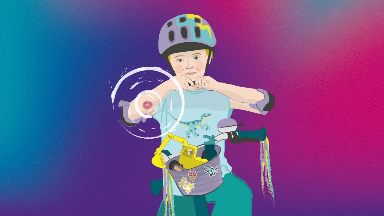 Kind auf einem Fahrrad mit Verletzung am Arm